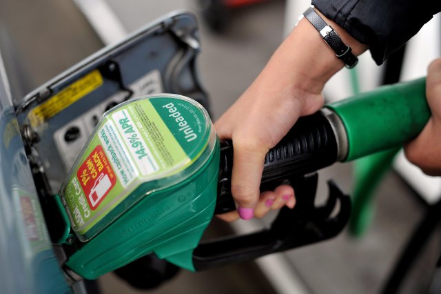 filling with supermarket fuel prices petrol green pump